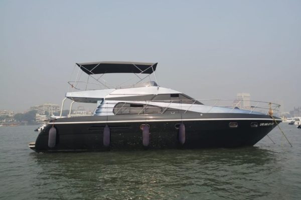 Ambassador 47 Motor Yacht on Charter in Mumbai at Gateway of India